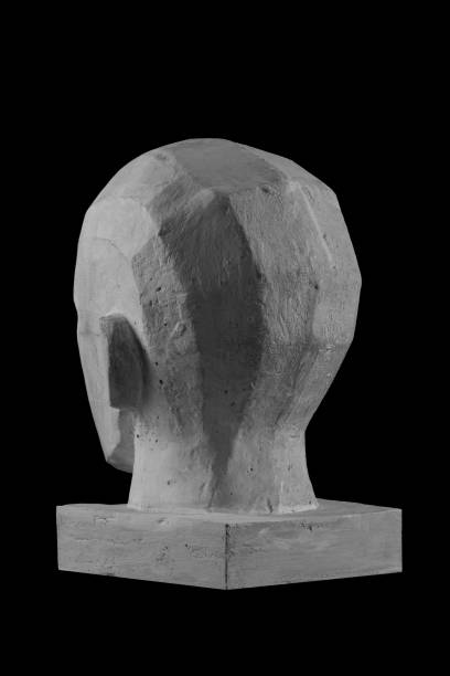 istock plaster statue of a human skull and head with an angular outline graphic 870605832