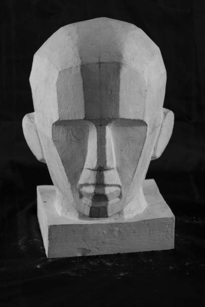 istock statue of a man with an angular drawn face graphic outline. 870606362