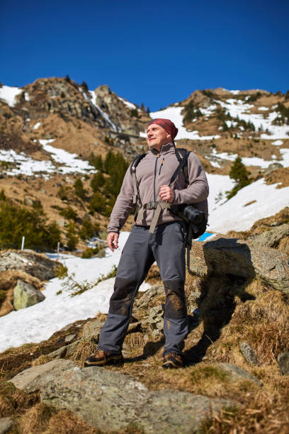 istock Professional nature photographer in the mountains 870609066