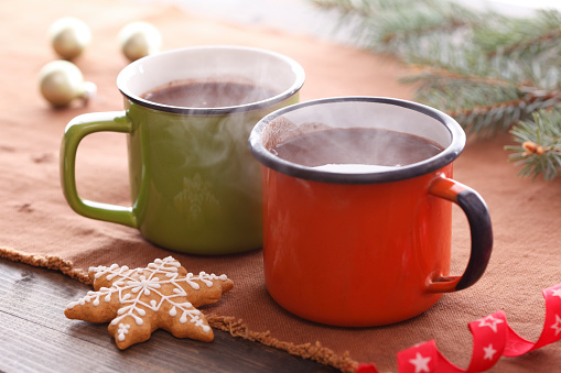 Hot chocolate with gingerbread cookie.