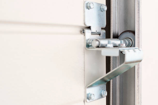 istock Garage door rail and wheel 870616444