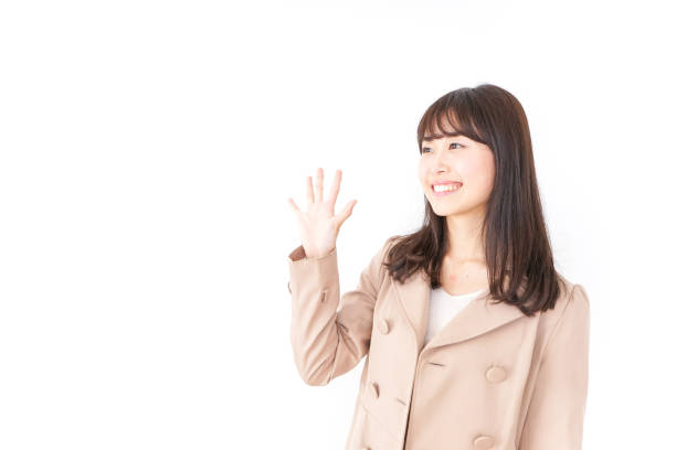 istock woman in coat 870618654