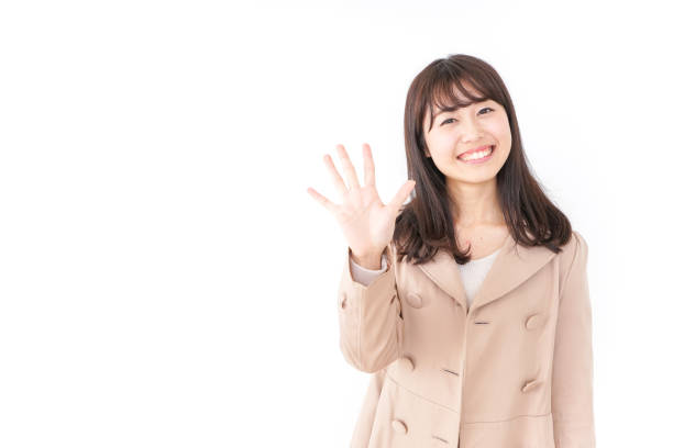 istock woman in coat 870618670