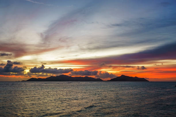 istock romantic sunset in paradise, silver spring cove, the dike, seychelles 13 870626060