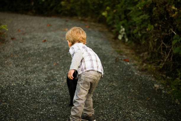 istock Child Discovering the Joy of Animals 870640378