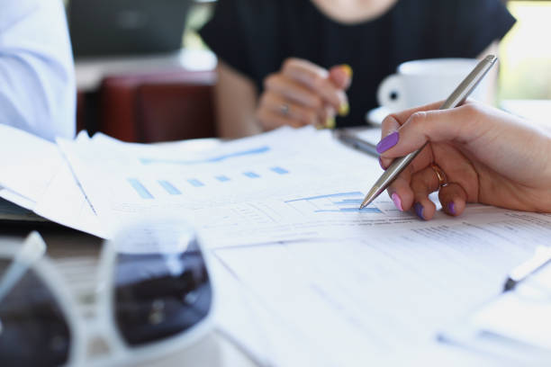 istock Group of people discuss plan at cafe 870640554