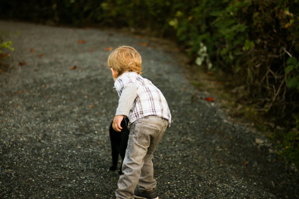 istock Child Discovering the Joy of Animals 870640650