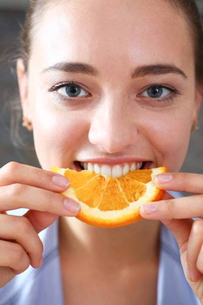 istock Woman portrait holds in her hand a slice 870640948