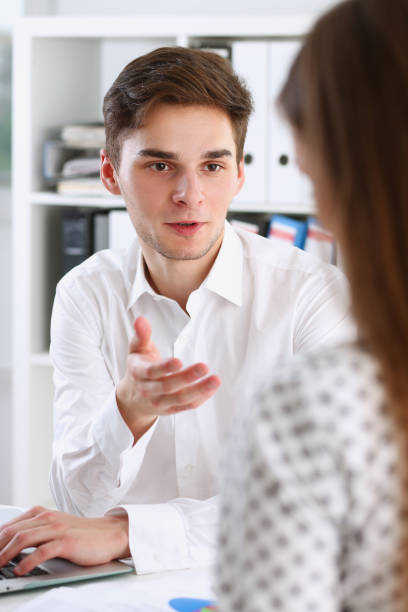 istock Male arm in white shirt offer contract form 870641234