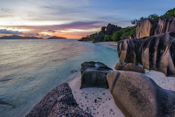 istock romantic sunset in paradise, silver spring cove, the dike, seychelles 16 870641558