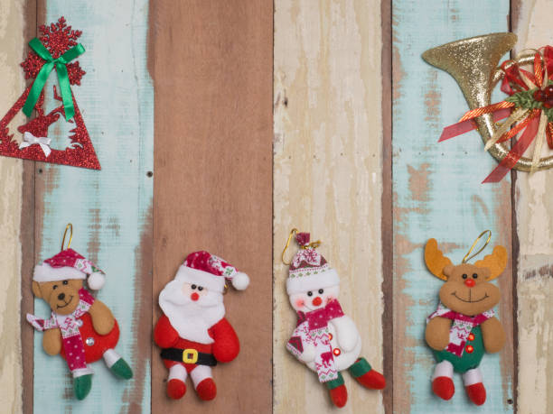 istock Christmas decoration cute object with wood background . 870661444