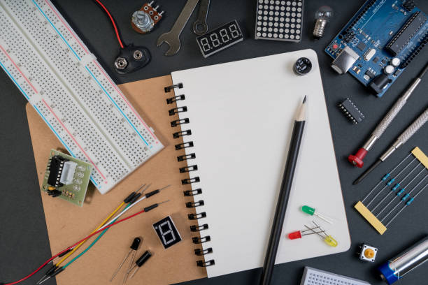 istock DIY Robot engineer made on base of microcontroller and variety of sensor and tools. 870664668