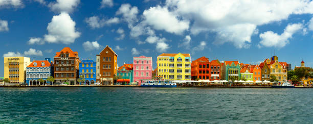 Pretty Face of Willemstad Curacao Rainbow by the water. willemstad stock pictures, royalty-free photos & images