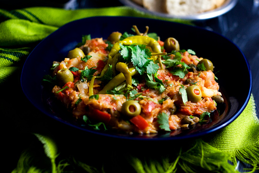 Bacalao or salted fish Biscay style with olives and peppers.