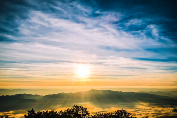 istock Mountain landscape with moody backlight sunrise sky background 870691416