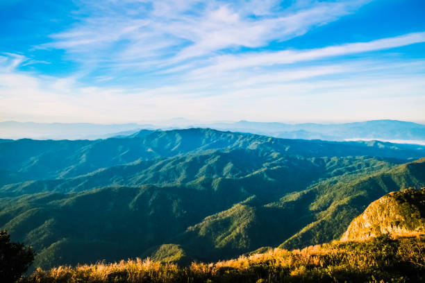 istock Mountain landscape with cloudy blue sky background 870691446