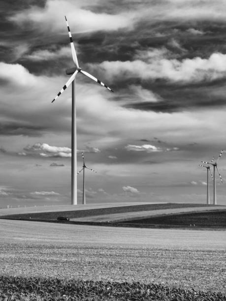 istock Landscap black and white wind turbines 870694680