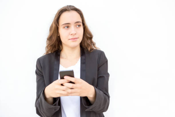 istock Concentrated female manager thinking of message 870704040