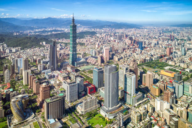 Skyscrapers of a modern city with overlooking perspective under blue sky in Taipei, Taiwan stock photo