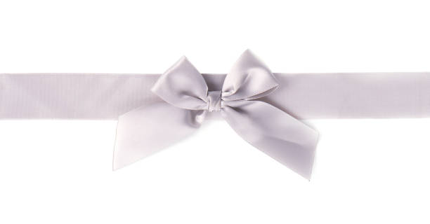 istock Silver ribbon pearl satin stripe band fabric bow isolated on white background 870714360