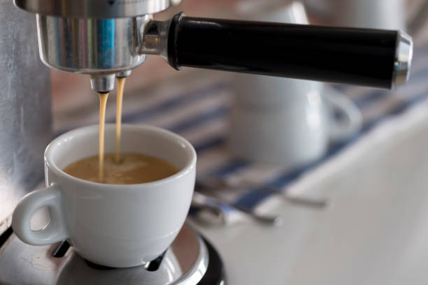 istock Professional coffee machine making espresso at home 870722570