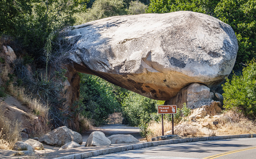 Tunnel rock. Natural stone arch and a passage under it. Scenic attraction of Sequoia National Park, California, USA