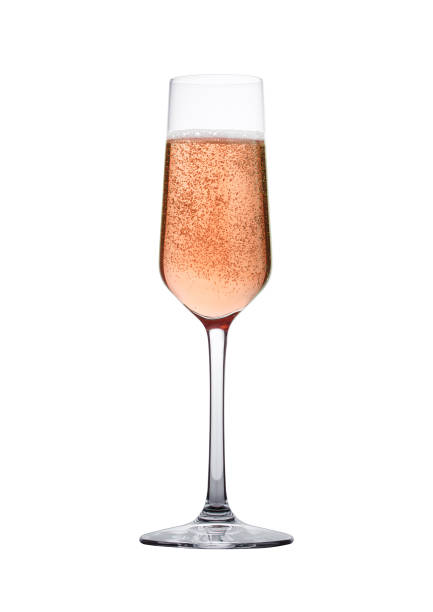 istock Rose pink champagne glass with bubbles isolated 870758514