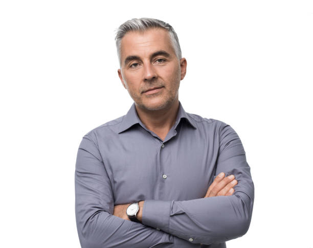 istock Confident businessman posing with crossed arms 870758596