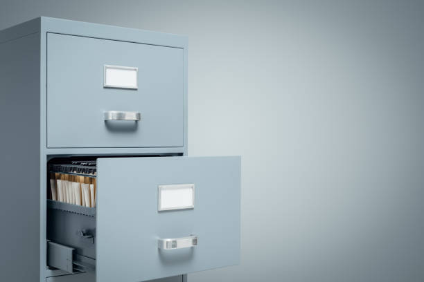 Filing cabinets and data storage Filing cabinet with open drawer and folders inside, storage and administration concept filing cabinet photos stock pictures, royalty-free photos & images