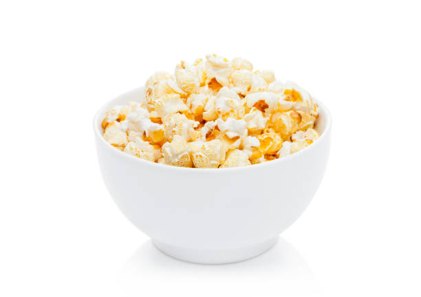 istock Popcorn salty sweet snack in white bowl 870774838