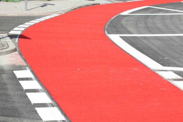 istock Red bike path, red ground marking 870796082
