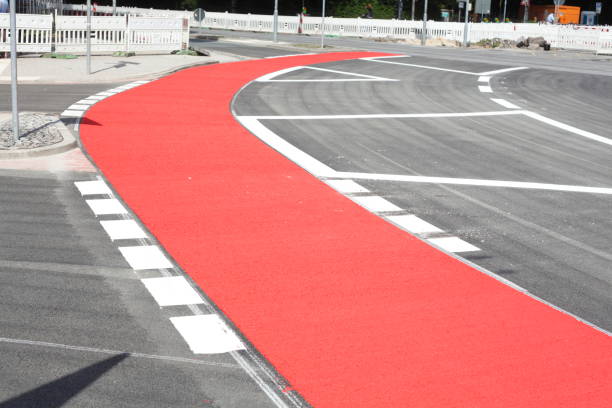 istock Red bike path, red ground marking 870796236