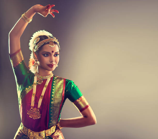 beauty of classical indian dance. young woman dancer  is performing indian dance bharatanatyam. - traditional dancing ballet dancing classical style imagens e fotografias de stock