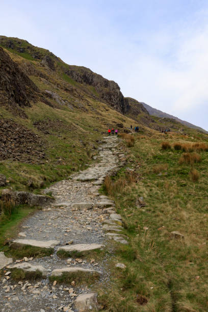 foot path to the summit of Mount Snowdon in Snowdonia foot path to the summit of Mount Snowdon in Snowdonia, Wales mount snowdon photos stock pictures, royalty-free photos & images