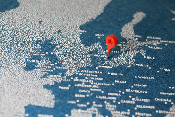 istock airplane fly on the blue painted map 870821516