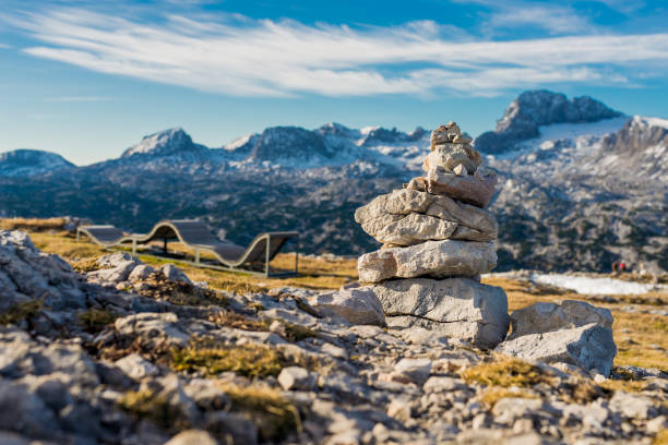 istock Rock sculpture in a alps mountain on a sunny day 870824188
