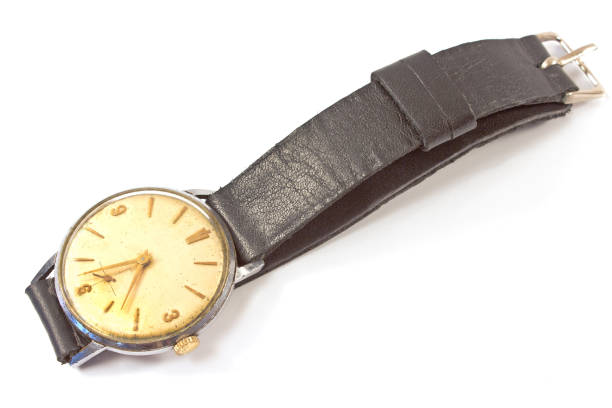 istock Old wristwatch isolated on white 870825612