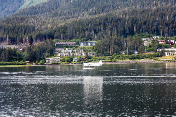 istock White Seaplane Landing in Juneau 870828724