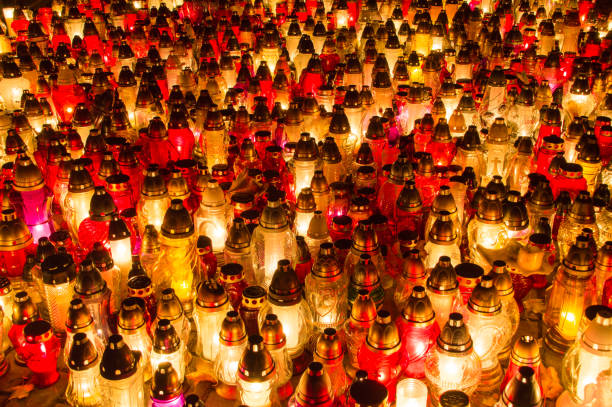 istock A lots of graveyard candles as background. 870828800