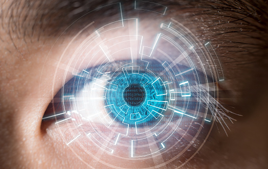 Close-up of blue eye digital scanning technology concept in future