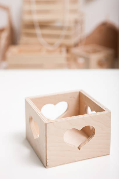 istock Close up wooden box with heart shaped hole 870847404