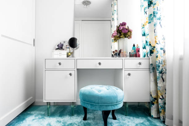 istock Modern white, feminine dressing room with minimalist vanity table and mirror 870849996