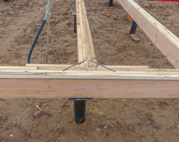istock the timber framing of a house on pile Foundation 870854222