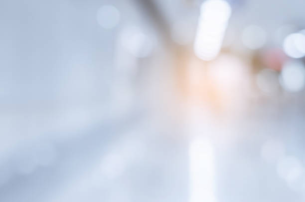 istock blur walkway platform in to modern subway. blur abstract background concept. 870854254