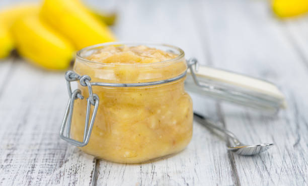 istock Banana Puree on wooden background 870857588