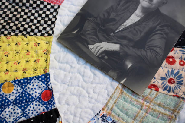 1930's Quilt with Photo of the Hands that Made It stock photo