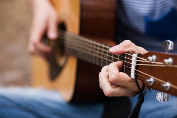istock Musician lifestyle guitar nature concept. 870897680