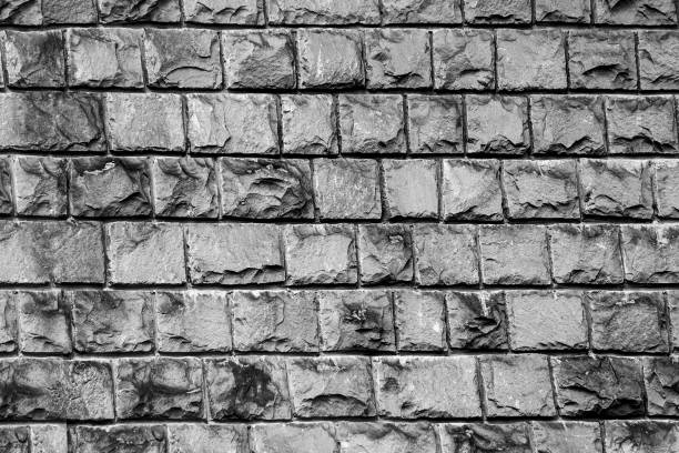 istock old wall, lined with a stone of black color 870902030