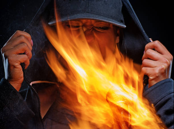 Female Rapper Performing into Burning Microphone