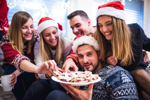 istock Friends eating pie at Christmas 870905390